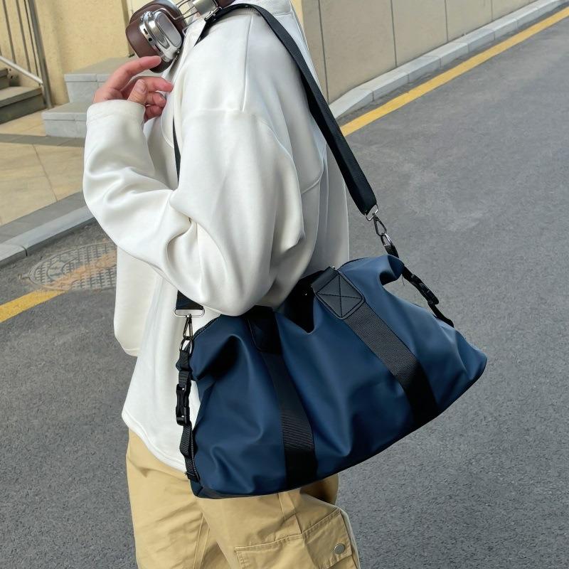 A Large-capacity Water-resistant Travel Bag Carried By A Man, A Single-shoulder Crossbody Luggage Bag and A Storage Bag