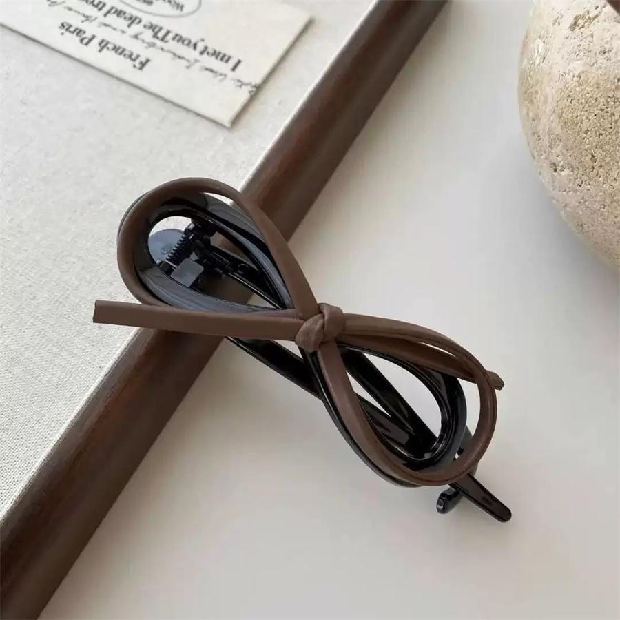 

Темпераментный кожаный бант, закрученный зажим для женского затылка, ощущение высокого класса, зажим-линия для аксессуаров для волос