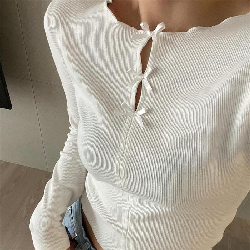 Women's Spring Casual Solid Color Round Neck Hollow Bow Knit Top