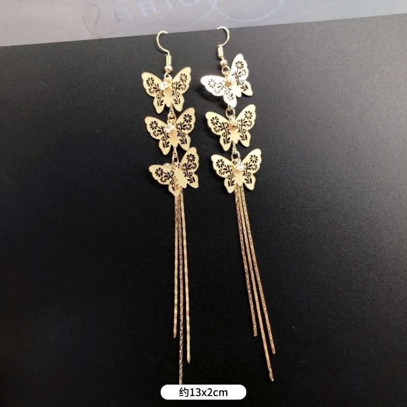 Fashion exaggerated niche temperament fringed earrings retro personality versatile sequined earrings women's long ear jewelry