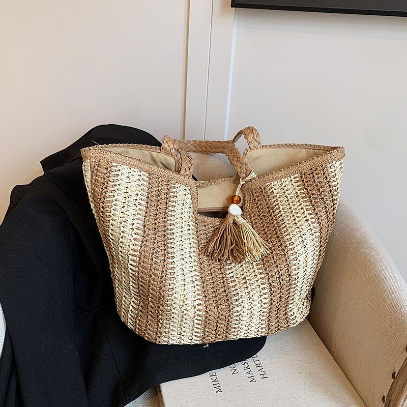 

Large capacity straw bag women s 2025 new beach seaside vacation shoulder bag fashion woven commuter tote bag срібний