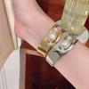 European High-End Oval Hollow Metal Pearl Bracelet - Stylish Exaggerated Hand Jewelry