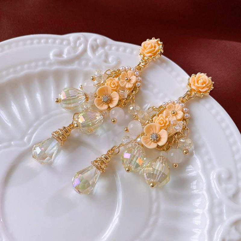 

Елегантні ретро сережки з китицями з діамантів та цирконію