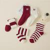 Chaussettes Ankola Tendance pour Femmes: Automne/Hiver Rouge Nœud Mi-Tube, Manchette Haute, Mode Rayée.