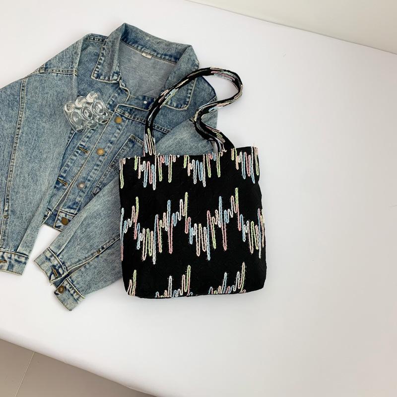 Personalized fashion casual trend armpit bag 2025 new foreign style commuting large capacity shoulder portable tote bag