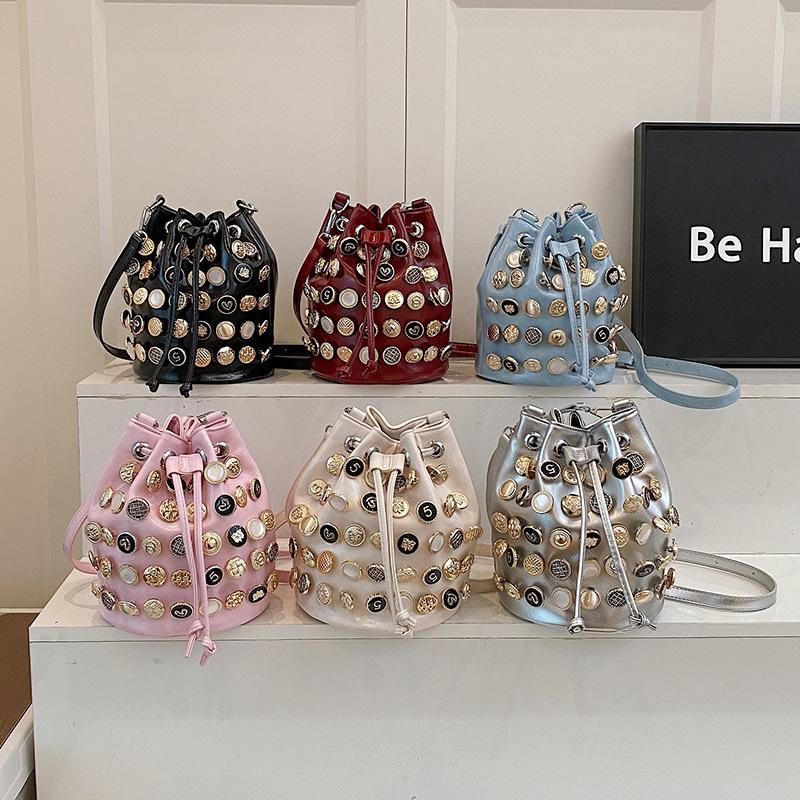 Bag summer 2025 new European and American fashion rivet shoulder bag women's versatile crossbody punk feng shui bucket bag pu