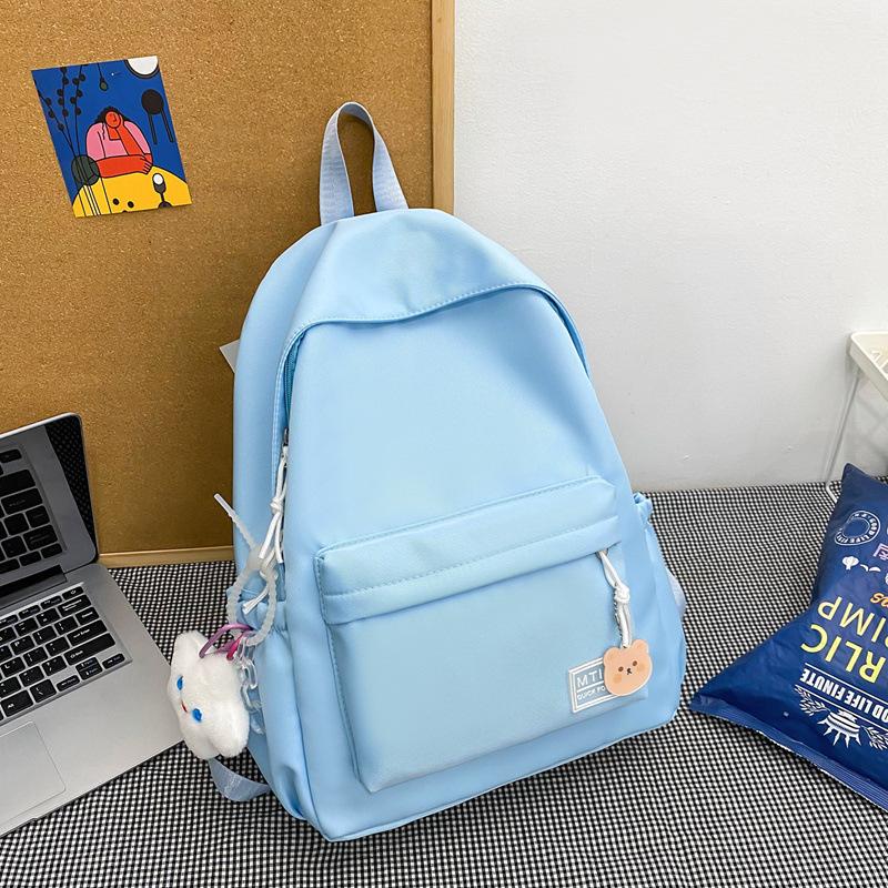 Small fresh girl backpack Japanese solid color schoolbag female Korean version ins versatile large capacity student backpack new