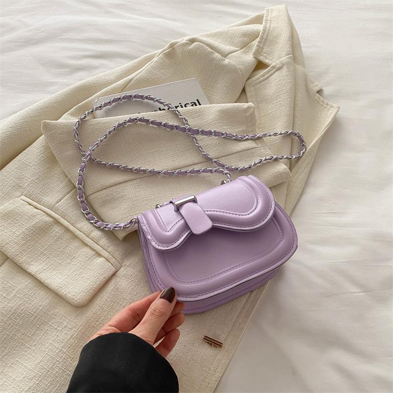 Textura de color sólido moda simple bolso pequeño bolso de cadena para mujer 2025 primavera nuevo versátil ins mensajero bolso de silla de montar