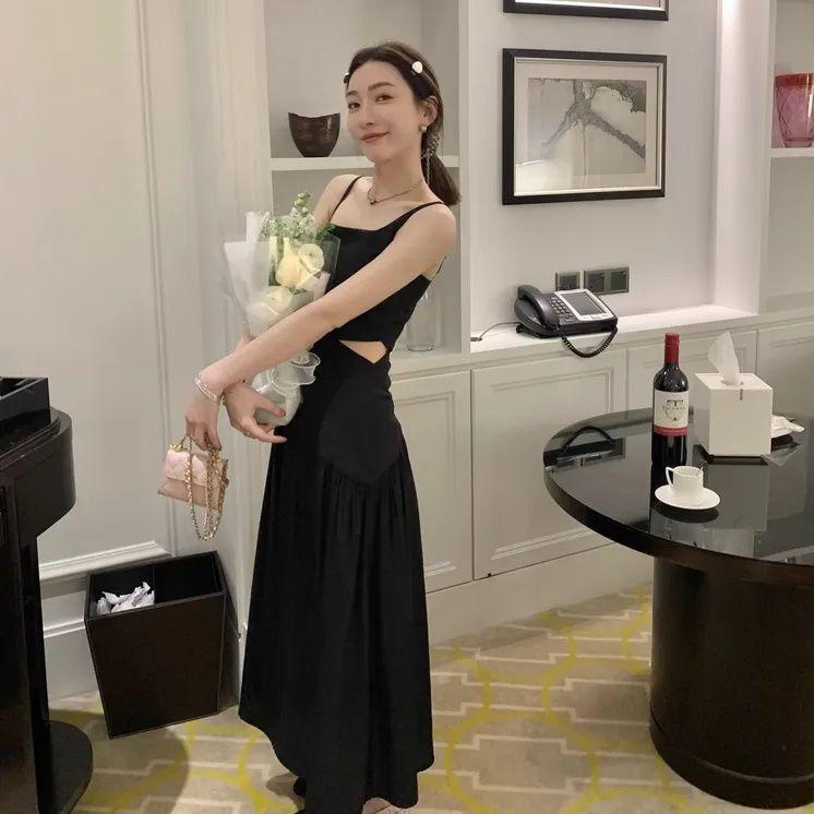 Royal sister fashion style irregular pleated suspender dress women's new high-end sense light luxury waist thin long skirt