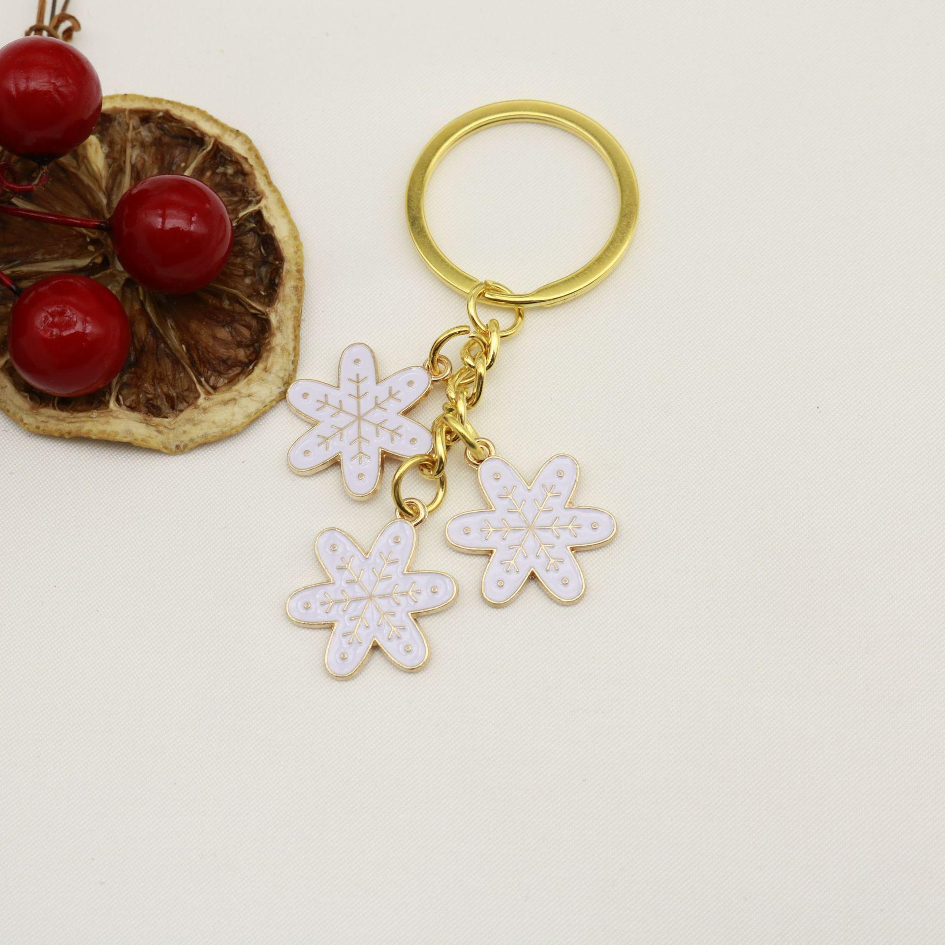 Creative Snowflake & Bell Christmas Alloy Keychain – European-American Ornament Gift