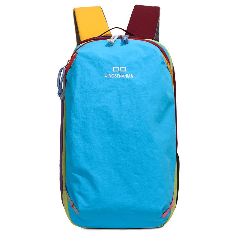 

Color Block Backpack with Adjustable Straps Lightweight School and Travel Bag for Students and Outdoor Use синій