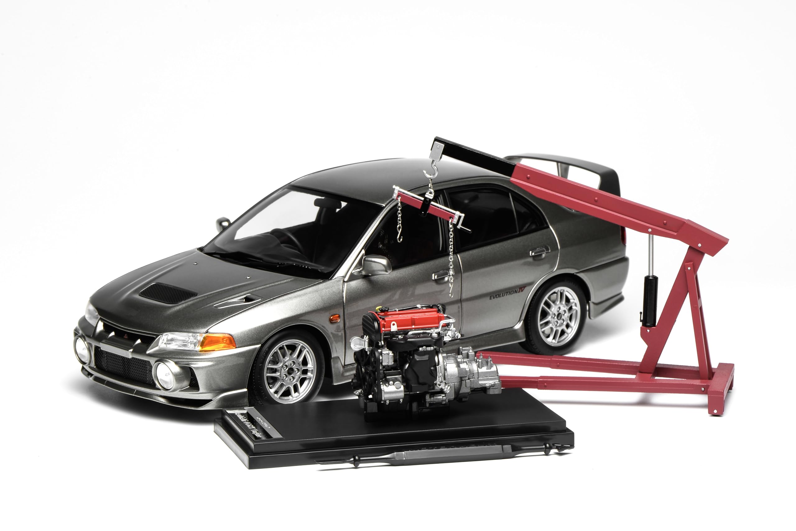 

FREESTYLE MOTORHELIX Масштабная модель Mitsubishi Lancer Evolution EVO IV Стальной Серебристый Металлик M84001 1/18