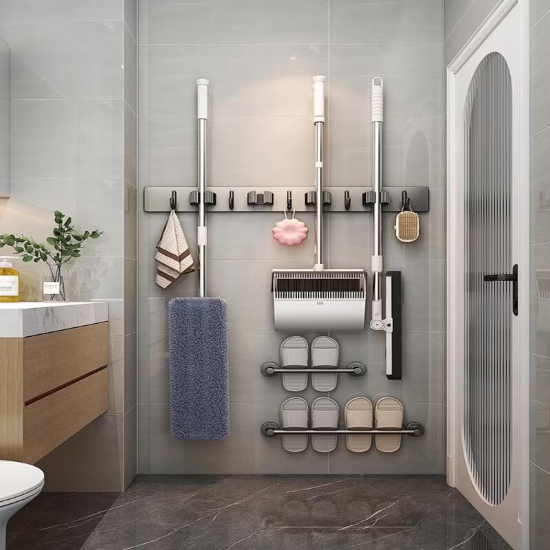 Samolepicí držák na mop a koště z nerezové oceli