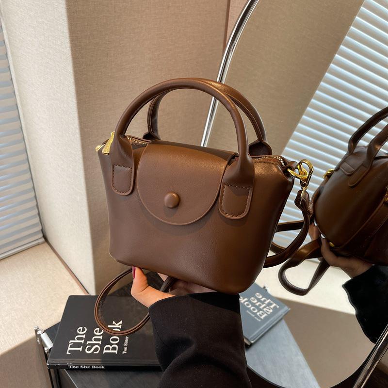 Женская модная высококачественная нишевая текстурная сумка-ведро через плечо 1670₽