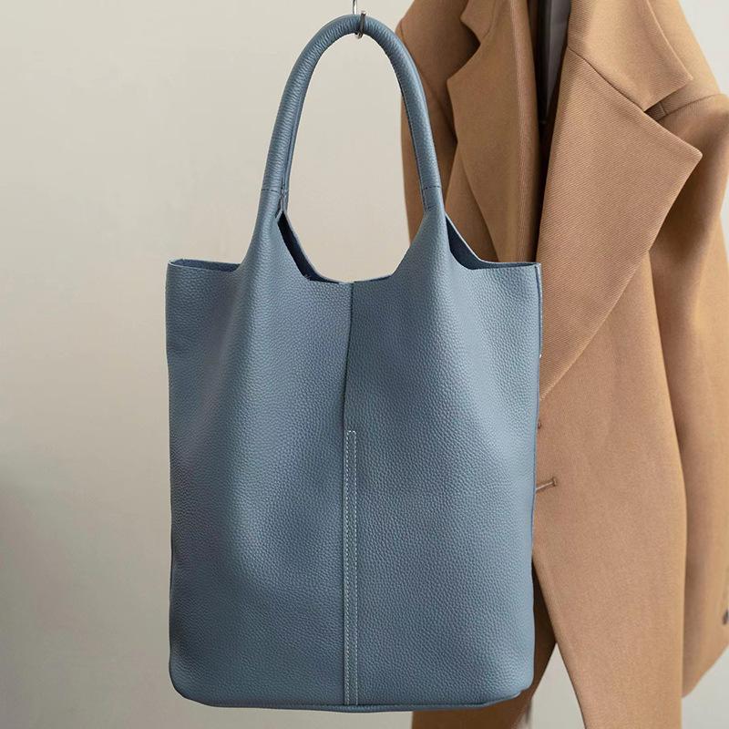 

2025 Корейская версия Большая вместимость Повседневная Сумка-тоут из коровьей кожи верхнего слоя Мягкая кожа Женская сумка Простая Наплечная Сумка-тоут Подмышечная Мать-дочь 29*33*14 синий