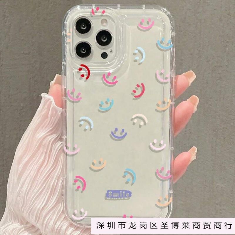 Colorful smiley face is suitable for Apple 16promax mobile phone case 15plus14 transparent 13 airbag 12 European and American explosion