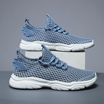 Leichte bequeme Freizeitschuhe Mesh-Oberfläche atmungsaktive hohle Sneaker 2024 neue Herrenmode weiche Sohle Modeschuhe