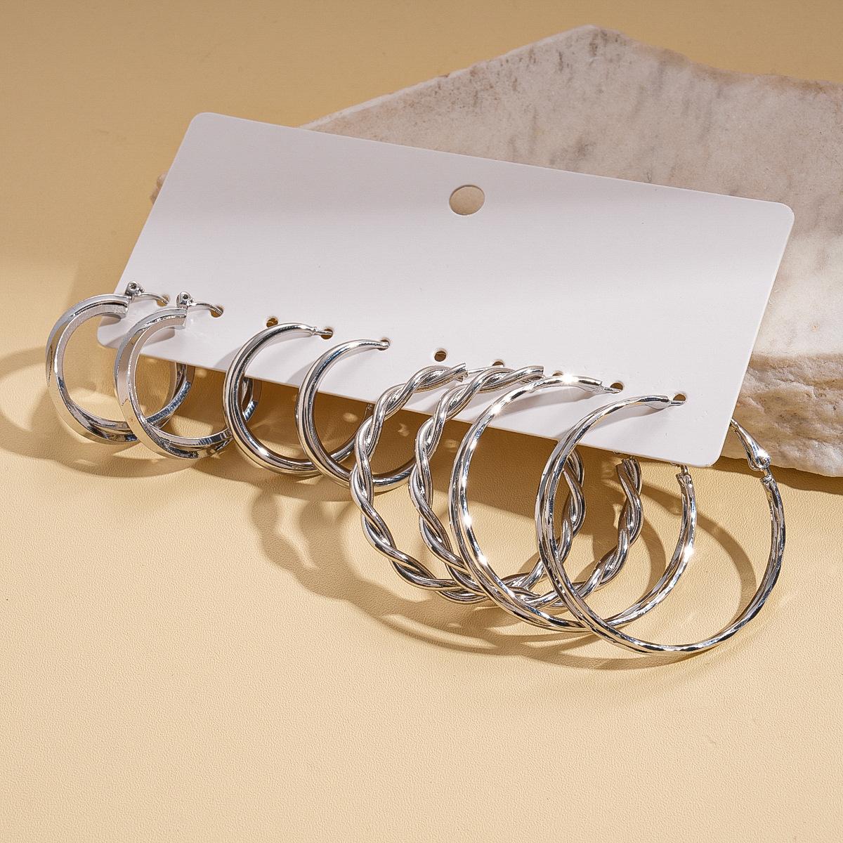 Серьги-гвоздики серебряные, геометрические, круглые, с перекрученной нитью, восемь штук, холодный ветер, универсальные серьги
