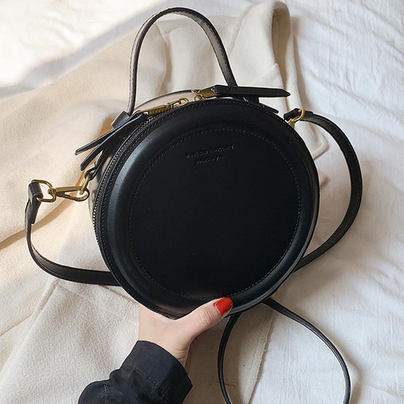 

Модная женская однотонная круглая маленькая сумка через плечо из искусственной кожи, универсальная сумка через плечо 20x8x20cm чёрный