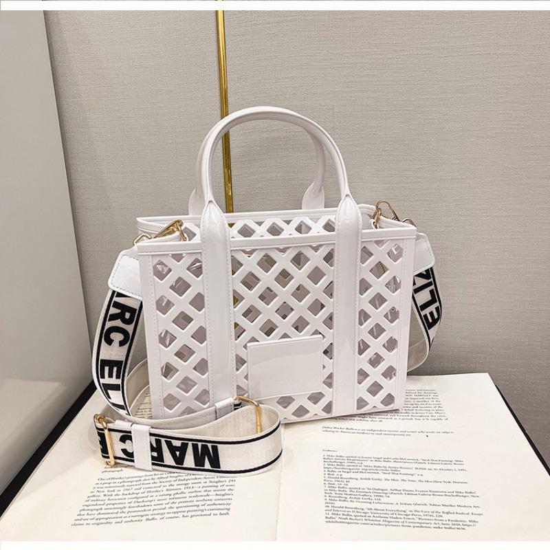 Mode Bonbonfarbe Strandtasche Damen neue personalisierte hohle Handtasche Nische Schultertasche Umhängetasche