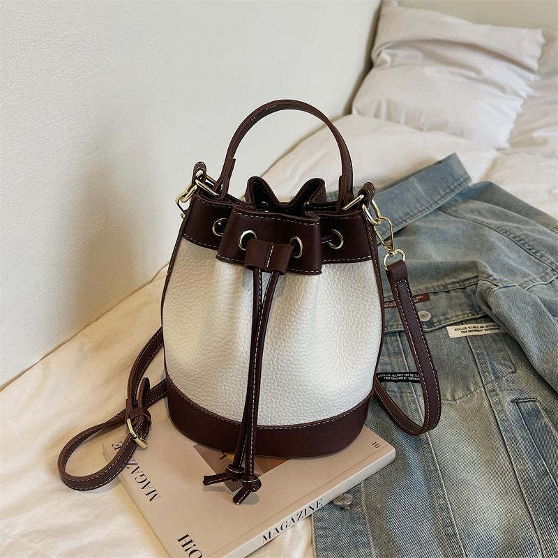 2026 New Arrival Two Tone Bucket Bag for Women Drawstring Closure Top Handle Crossbody Bag with Detachable Strap Trendy Fashion