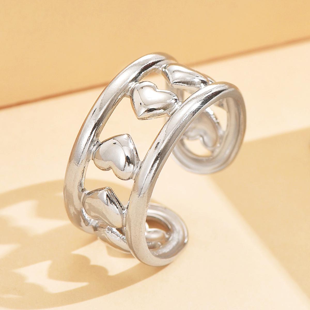 Elegant Retro Stainless Steel Heart Ring - Hollow Design, Thick Metal Feel