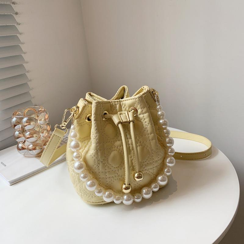Niche pearl spring and summer bag women's new women's shoulder messenger bag embroidery thread bucket bag tide