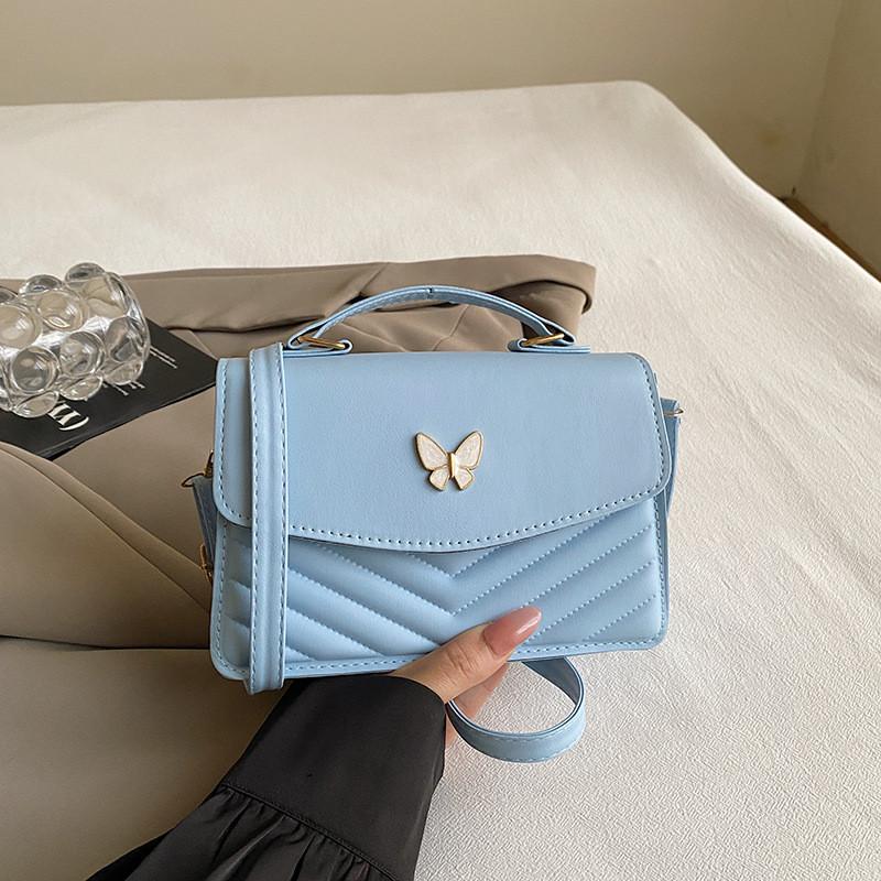 Stylish Retro Small Crossbody Handbag For Women With Chic Butterfly Accent And Medium Size синий