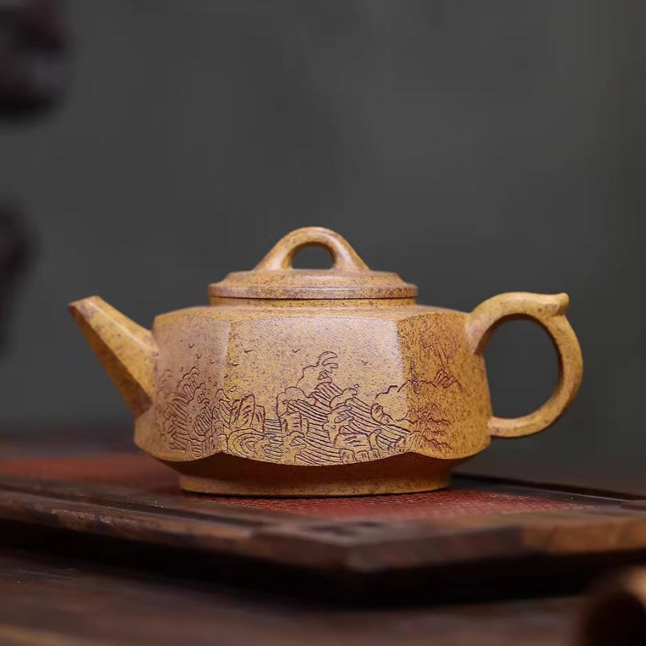 Hexagonal Sea View Yixing Zisha Teapot with Dragon Bone Gold Sand