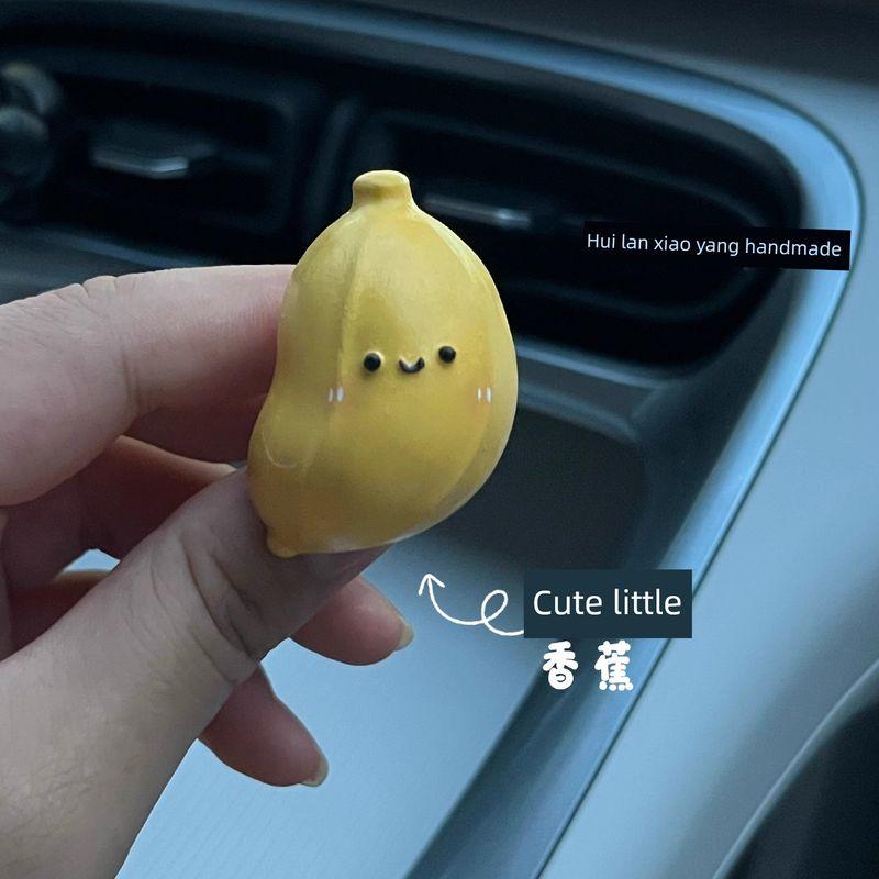 

2025 New Creative Car Fragrance Diffuser with Long-Lasting Light Scent, Tesla Car Air Conditioning Vent Ornament, Aroma Diffuser Gypsum Small Banana Other notes