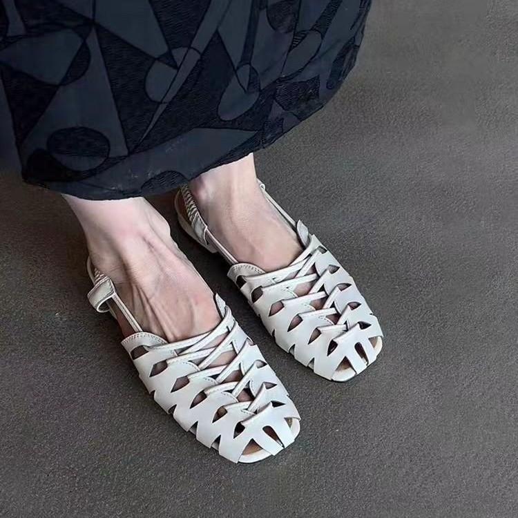 Sheepskin version~ French niche hollow breathable soft leather Roman sandals women's summer back strap flat-bottomed bag head pig cage shoes