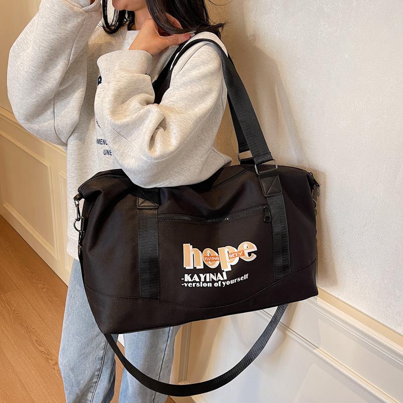 Color matching fitness bag Large capacity letter printing Light dry and wet separation Luggage bag Convenient shoulder messenger travel bag