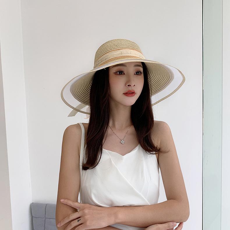 Wide Brim Bucket Hat with Elegant Black Bow - Breathable, Inelastic, and UPF Protective - Perfect for Beach, Travel, and Holiday Outings
