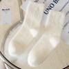 Women's mid-tube mink velvet socks for autumn and winter. Thick, warm, and fluffy for postpartum and sleep.