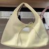 Gentle and sweet strap bow handbag spring new simple casual large-capacity dumpling bag