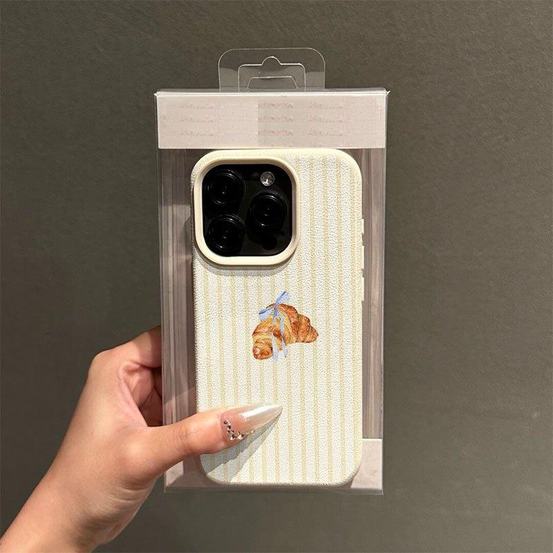 A Striped Croissant-Patterned Phone Case with Lychee Texture, Suitable for iPhone 17, 16, 15, Plus, Pro, Max Series Phones — Can Be Used as a Gift