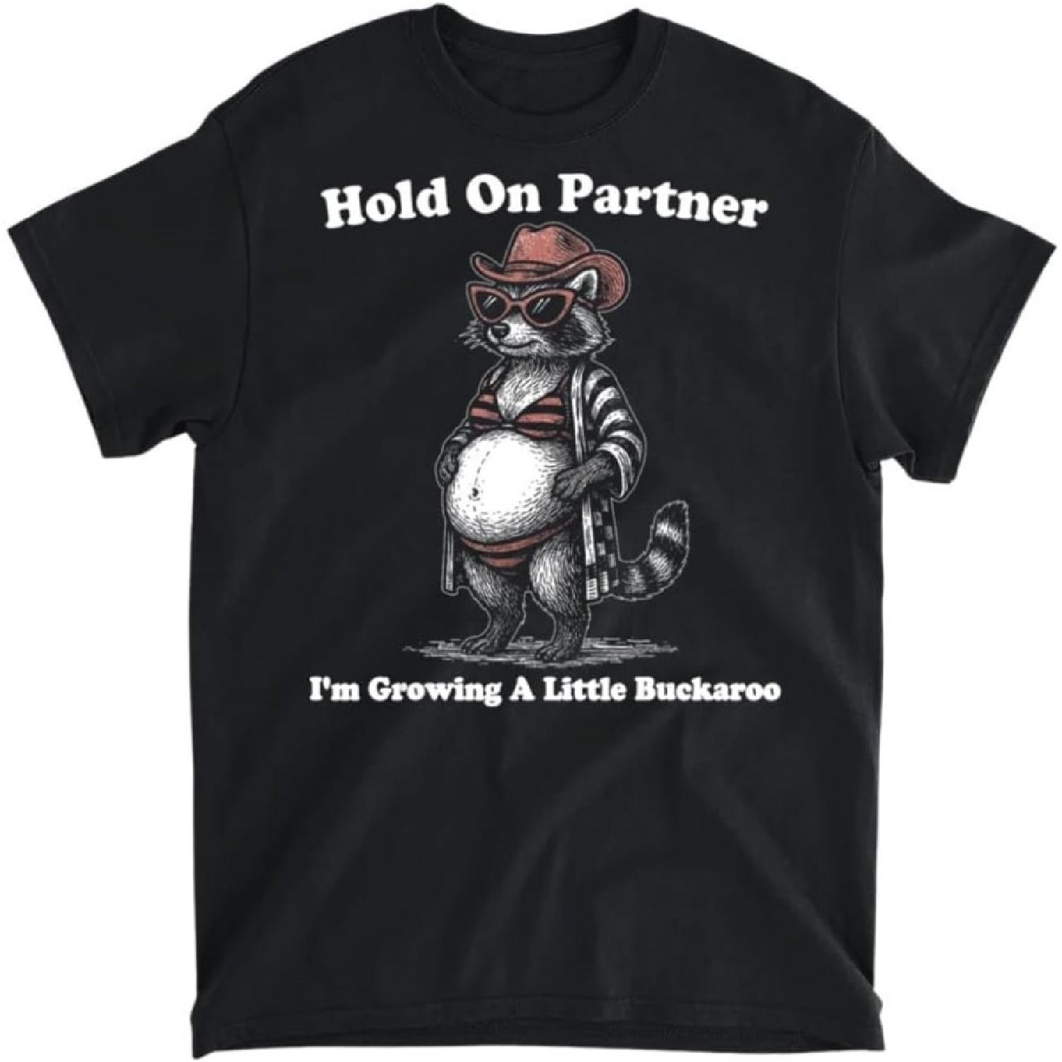 Hold on Partner I m Growing A Little Buckaroo Raccoon Cowboy T-Shirt, Tank Top, Long Sleeve, Sweatshirt, Hoodie Men Women Kids Made in Canada Black S