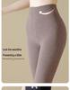 Women's Fleece-Lined Vertical Stripe Leggings – Thickened, Slimming, and Warm Cotton Stirrup Tights for Autumn and Winter.