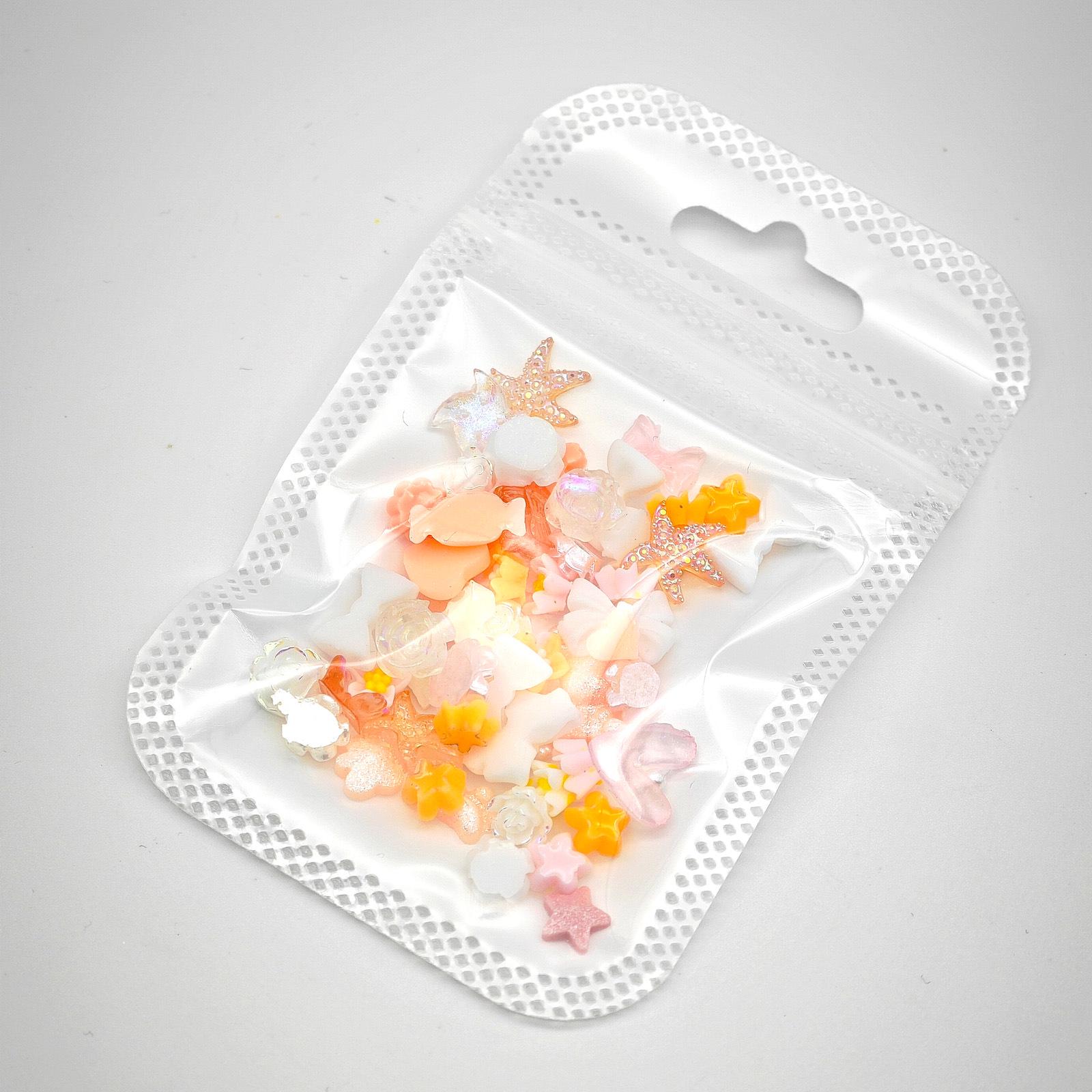 

Popular Nail Art Kit: Orange Mix Resin Bear, Bow, and Flower Decorations