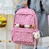 Schoolbag Leopard print canvas schoolbag Women's backpack High value niche American leisure travel backpack Large capacity Lightweight versatile