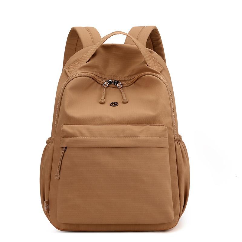 Простой повседневный рюкзак женский новый дорожный рюкзак большой вместимости брызгозащитный нейлоновый школьный рюкзак для студентов One Size