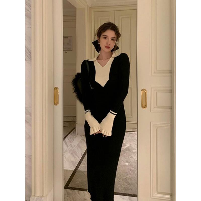 Beautiful rich family daughter feeling long black sweater with knitted backing dress women's autumn and winter