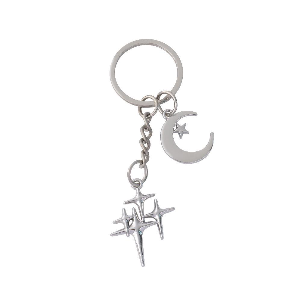 Elegant Star and Moon Hollow Keychain - Unisex Fashion Bag Pendant.