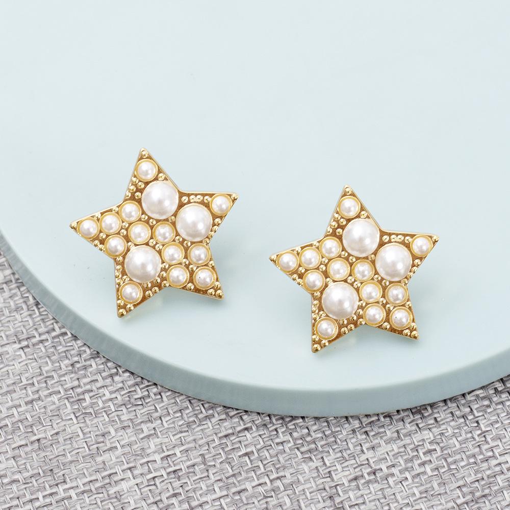 Korean Style Retro Women's Zinc Alloy and Imitation Pearl Star Stud Earrings