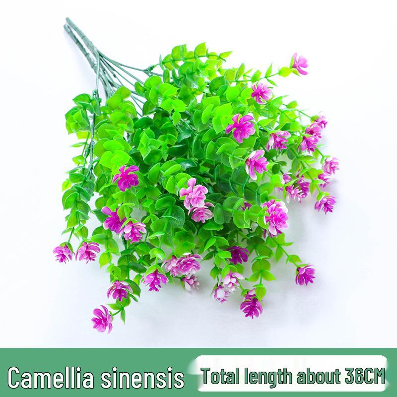 Kunstlik kameelia ja beebi hingamise lilleseade