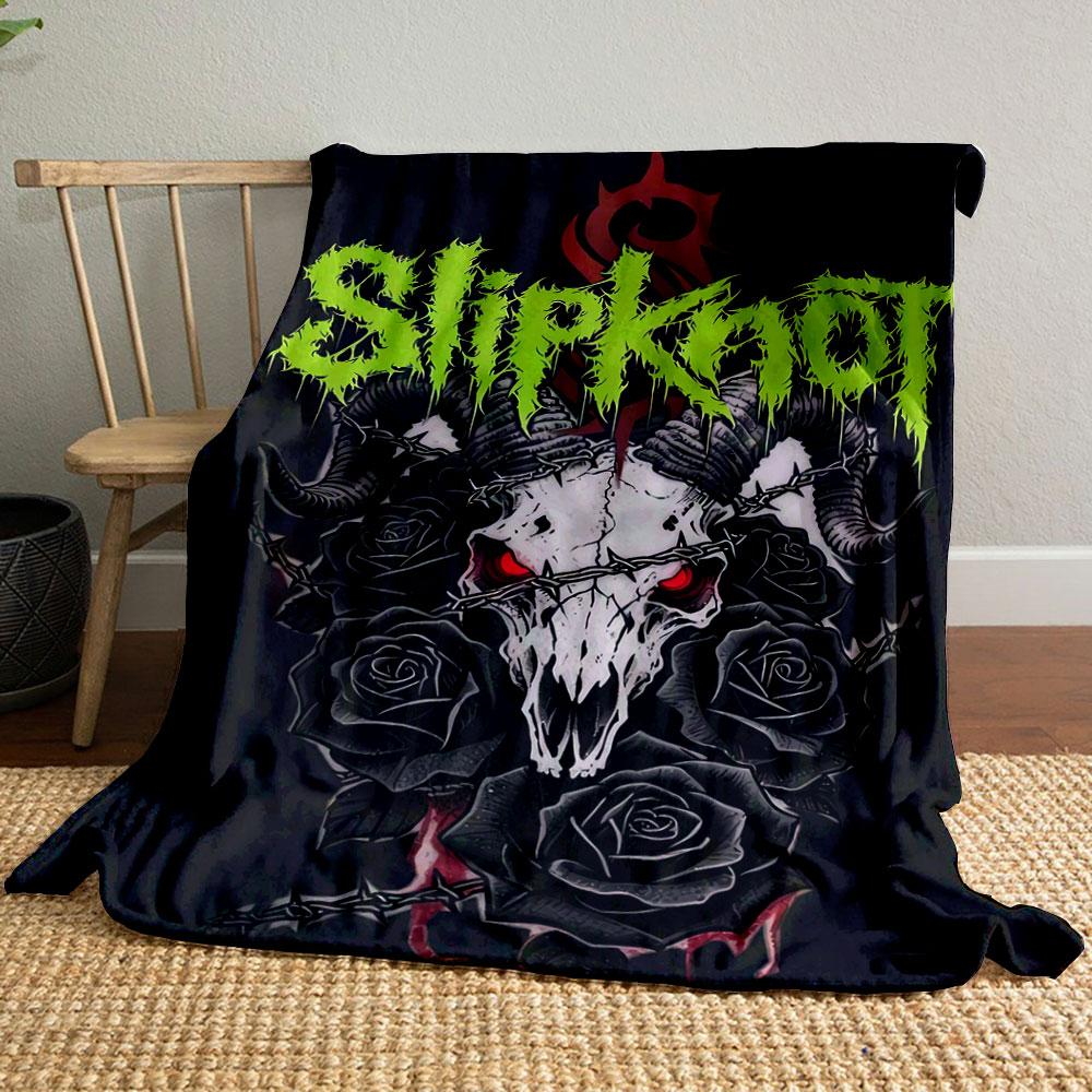A demonic skull with horns, red eyes, black roses, and barbed wire. for all seasons blanket lunch break throw gift