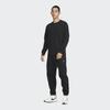 Nike Spodnie dresowe sznurowane z nadrukiem logo i podszewką z polaru Dziecięce doły Czarne DX1365-010