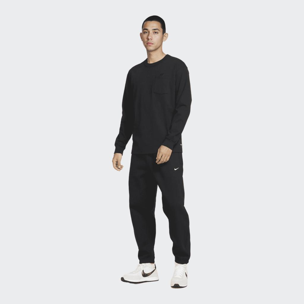 Nike Spodnie dresowe sznurowane z nadrukiem logo i podszewką z polaru Dziecięce doły Czarne DX1365-010