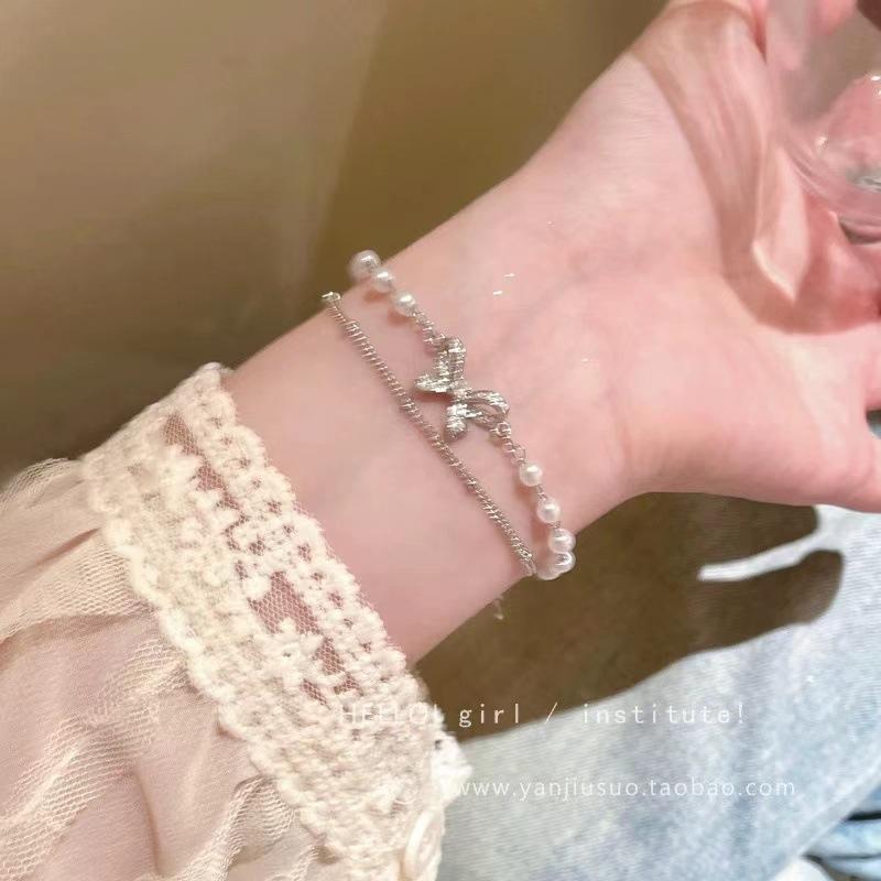 Double bow pearl stacked bracelet light luxury niche exquisite bracelet accessories student high value jewelry gift