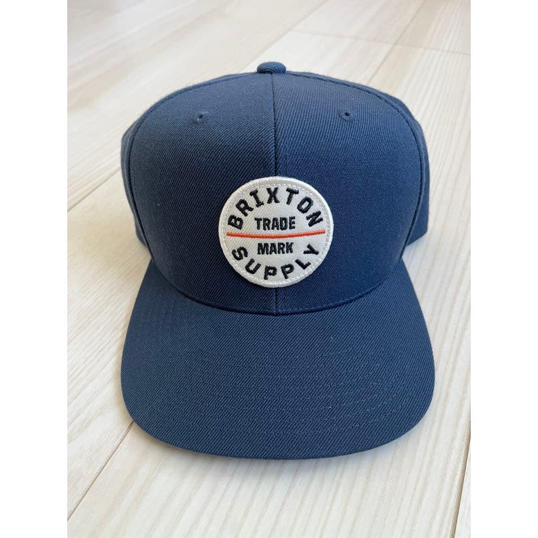 Used Brixton Navy Cap Logo Patch